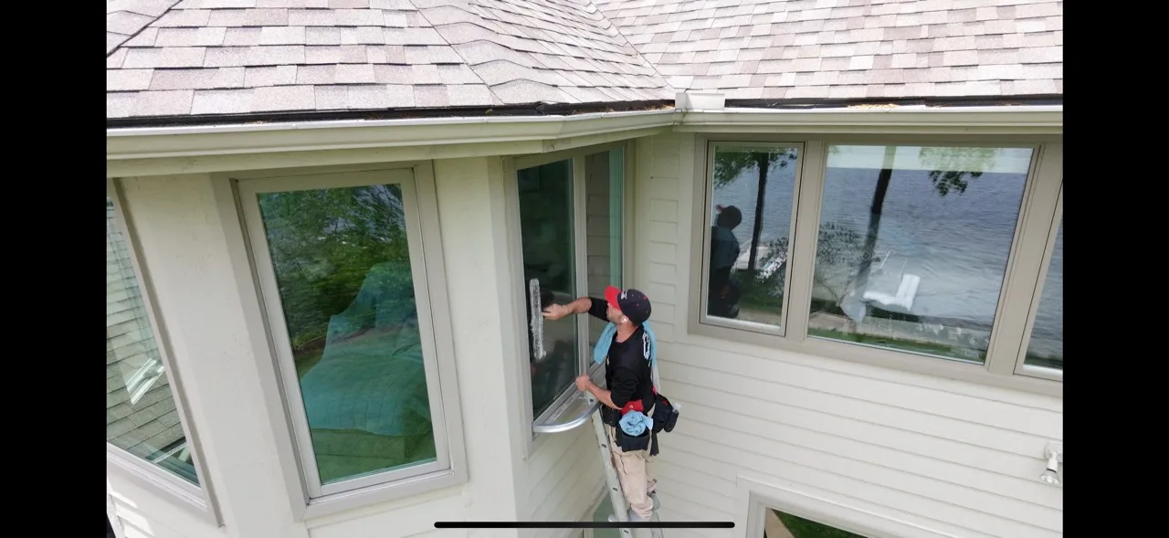 Wood deck during surface preparation with a floor sander and visible worn finish